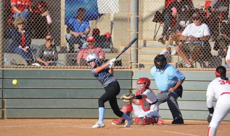 softball player at bat